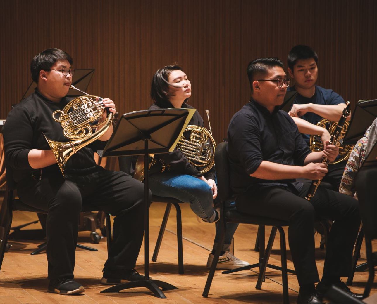 Seen in sequence: Benny (holding clarinet), Qiu Sheng, Yi-Ting and Xian Long (frontmost) in rehearsal.